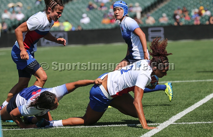 2018RugbySevensFri-06.JPG - Yume Okuroda of Japan tackles Ane Cecile Ciofani (2) of France in the women's first round of the 2018 Rugby World Cup Sevens, July 20-22, 2018, held at AT&T Park, San Francisco, CA. France defeated Japan 33-7.